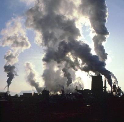 Photograph of a sky full of thick white and gray steam.