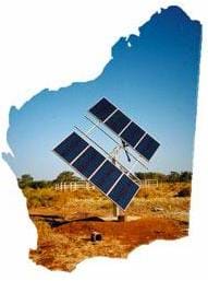 A photograph of photovoltaic (PV) panels pole-mounted in the desert. PV panels convert sunlight into electricity directly using a physical property called the photoelectric effect.