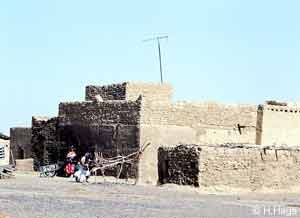 A home made of thick earthen walls.