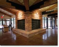 Photo of a floor inside a large room surrounded by walls of windows.