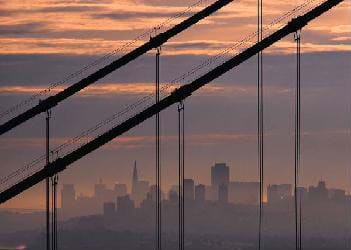 A photograph of smog over a large city.