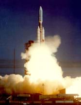 Photo shows a rocket blasting off with the exhaust from the burning fuel spreading rapidly.