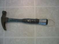 This is a picture of the hammer with string attached to it.