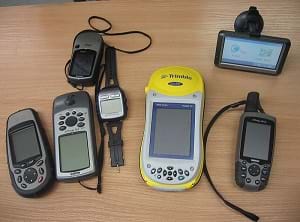 A collection of hand-held GPS receivers.