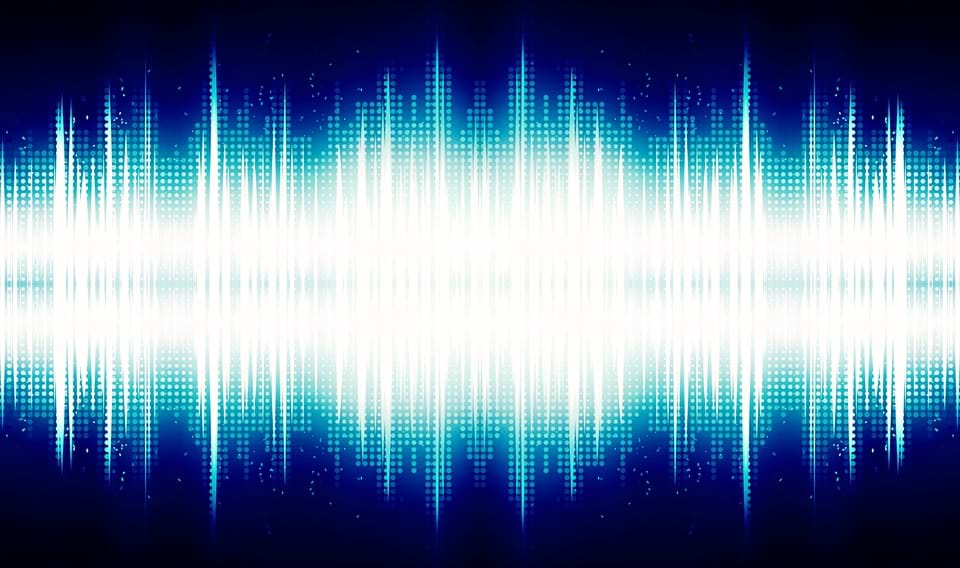 A blue and white audio sound wave. 