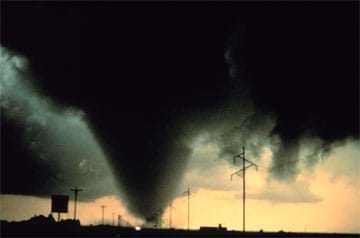 A photo showing a severe tornado in Texas with a close-up shot of the tornado's cone.