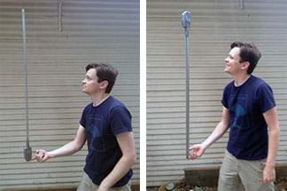 Two photographs show a man balancing with just his right index finger a three-foot stick with a weight on one end (four taped-on penny rolls). On the left, he tries to balance it with the heavier end at the bottom (near his hand), and on the right, he tries to balance it with the weight on the top. He is smiling in the latter case.