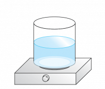 Beaker filled with water sitting on a hot plate.