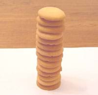 Photograph of a stack of 14 Vanilla Wafers. Photograph of a stack of 14 Vanilla Wafers.