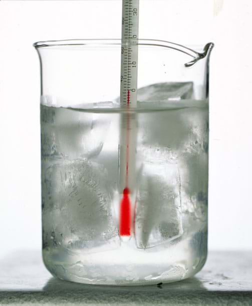 A thermometer immersed in ice water. 