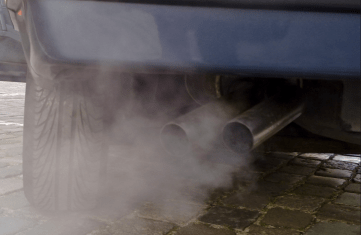 Exhaust from fossil fuel burning car engine.