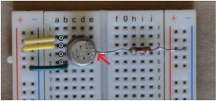 Photo shows a breadboard (circuit board) with a VOC sensor connected to it.