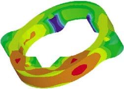 A colorful CAD drawing shows a circular part with color variations from red to orange to yellow to green to blue.