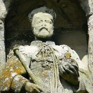 The King Edward VII statue in the North Gate of High Street in Salisbury, UK. This 100+ year old statue shows deterioration from acid rain, weather and wind.