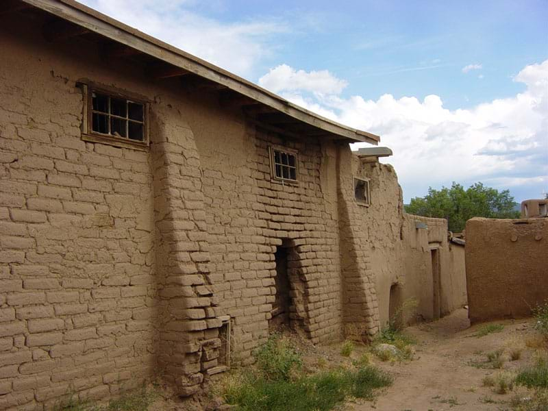 A home made of thick earthen walls.