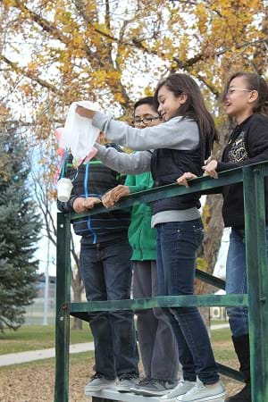 Students getting ready to launch their eggs from the launch pad.