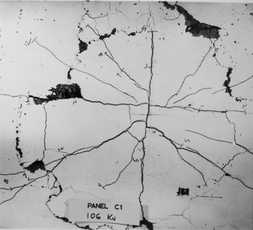 The pattern of a crack at the bottom of a surface of a punching failure zone during a bridge deck model test.