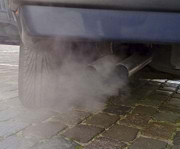 Emissions released into the air from a gas-powered car.