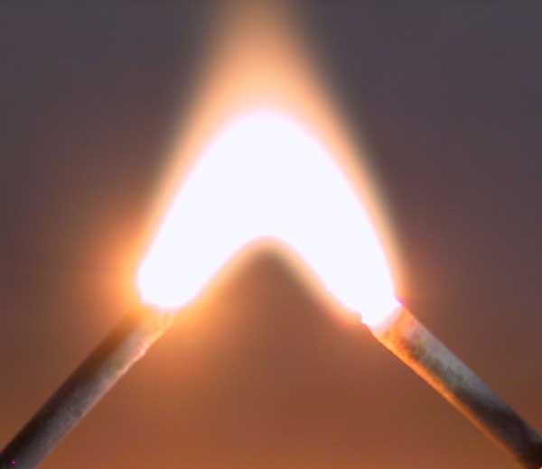 An electric arc generated between two nails.