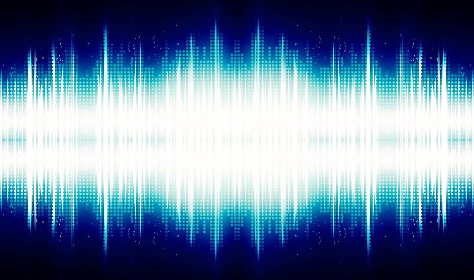 A blue and white audio sound wave. 