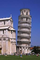 Photo shows an eight-story tower that clearly leans to the right, compared to a plumb building next to it.