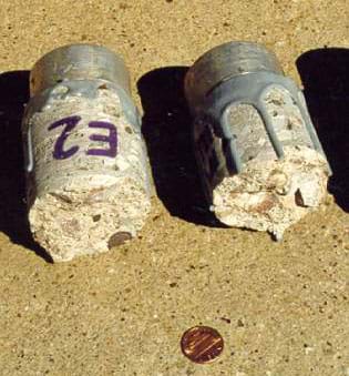 Photo shows a hand-sized cylinder of concrete, broken in half.