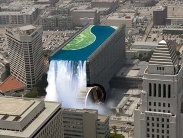 A fanciful aerial image shows what it would look like if a skyscraper topped with a water reservoir spilled over one edge of the building, turning a huge waterwheel, in the middle of a city.