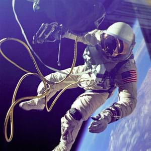 Photo shows a tethered astronaut "floating" in space.