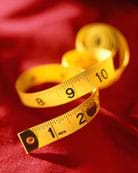 Photo shows a yellow, flexible metric measuring tape.