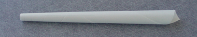 A photograph shows a spiraled, cone-shaped paper tube that will be formed into a strawket.