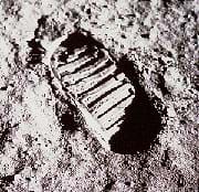 Photo shows ridged footprint in soil.