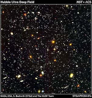 Photo shows an uncountable number of tiny bright spots on a black background.