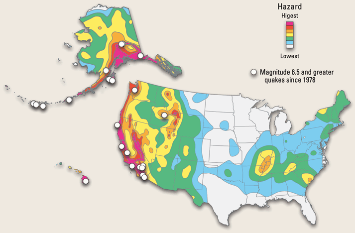 A colorful map of the United States, showing areas of earthquake hazard. High earthquake hazard areas are shaded in red. Low-hazard areas are white and light blue.