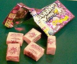 Photo shows an opened packaged bubble gum with five individual pieces.