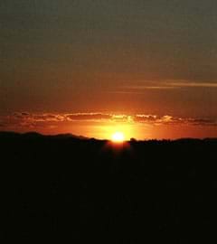 Photograph of an orange sunset.