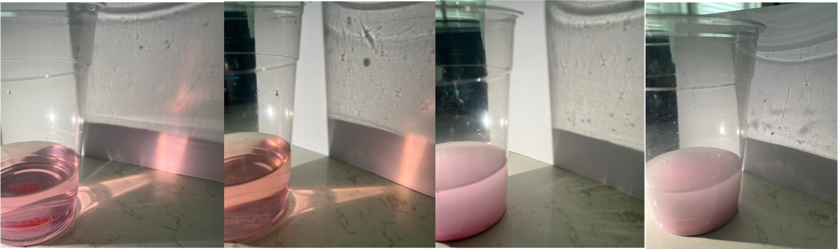Four images of four cups that have solution in every cup. Each cup has a liquid solution that contains water, food color, and corn starch. Light is trying to shine through each liquid solution. 