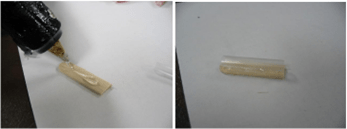Side-by-side photos of hot glue being applied to a wooden stick on the left, and a straw segment glued on top of the stick to create a flexible finger joint structure on the right. Side-by-side photos of hot glue being applied to a wooden stick on the left, and a straw segment glued on top of the stick to create a flexible finger joint structure on the right.