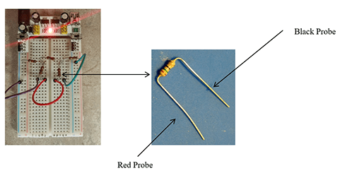 Two photographs. At left, a breadboard with numerous wires and resistors. At right, a close-up of a resistor with labels indicating which end connects to the black probe and which to the red probe. 