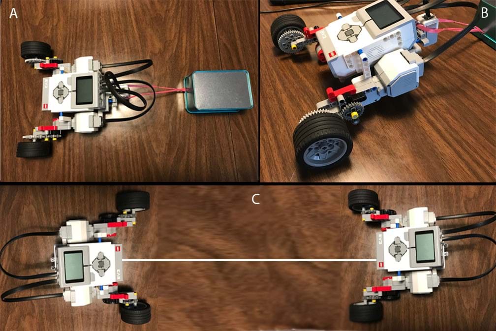 Robots can be tethered to either fender washers (acting as weights) or to each other, using nylon twine knotted to exposed axles on the robots.