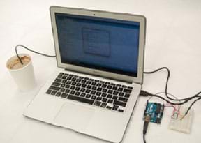 A photograph shows the Figure 2 setup (Arduino microcontroller and thermal sensor with wire connections to a breadboard) further connected to a laptop computer with the sensor probe submerged in a cup of hot chocolate.