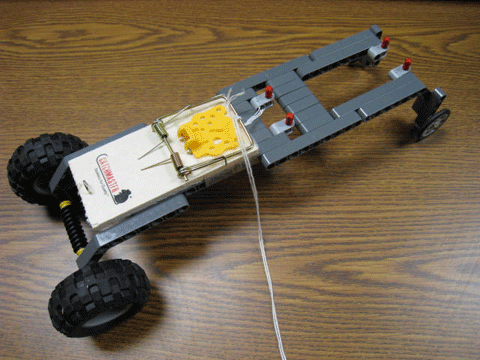 Photo shows a typical mouse trap racer made from a mouse trap and wheels.