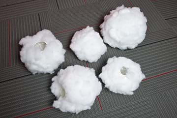 A photograph shows five polyfil-covered paper lanterns of different sizes. 