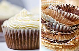 Two photographs. A close-up side-view shows a chocoate cupcake with white rippled frosting on top and a fluted white paper wrapper around its base. A stack of more than 10 discarded white paper fluted cupcake wrappers in a stack with chocolate cake residue inside each one.