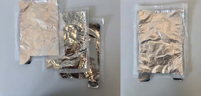 A photograph shows 3 pieces of wax paper and tin foil layered on the left, and then the stack of all 3 placed on top of one another on the right.
