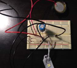 The same breadboard as figure 6, now with an LED light bar connected.