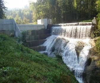 Photo shows a waterfall.