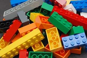 A pile of colorful LEGO blocks.