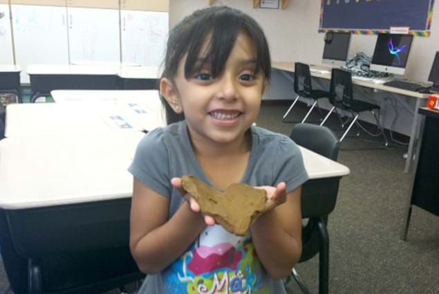 Young girl with cookie